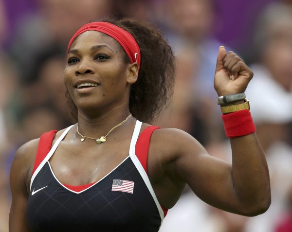 Serena Williams of the U.S. celebrates after defeating Russia's Zvonareva in their women's singles tennis match at the All England Lawn Tennis Club during the London 2012 Olympic Games